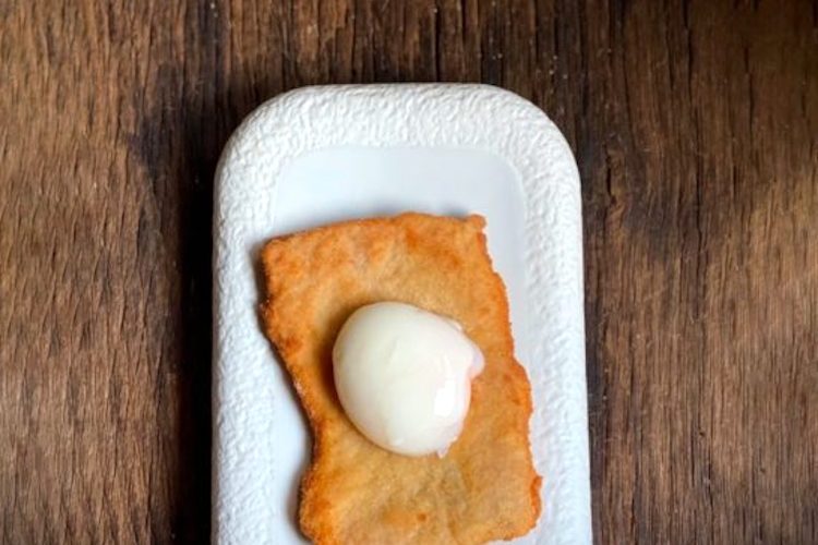 Escalope de ternera con huevo poché