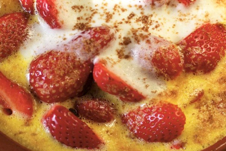 Fresones maduros al horno con naranja y azúcar