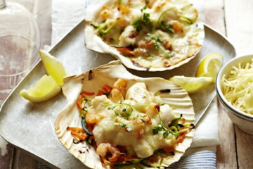 Conchas de pescado gratinadas con queso