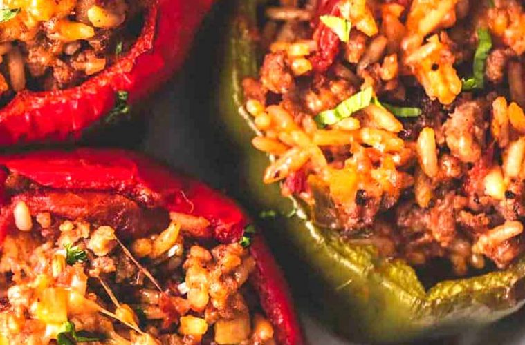 Pimientos rellenos con el arroz que nos sobró ayer