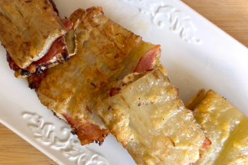 Pencas de acelga rebozadas con york y queso