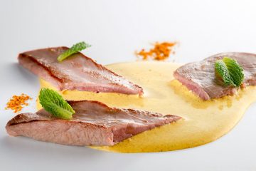 Solomillo de pato con salsa de curry y coco