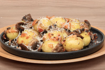Gnocchis con salmón ahumado y champiñones