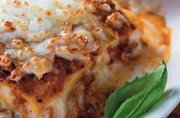 Lasaña de carne de pato confitada