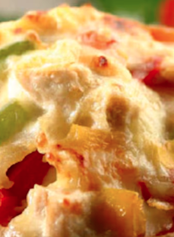 Calabazas rellenas de pollo y verduras, gratinadas con queso